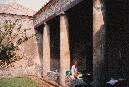 [Internal garden surrounded by columns.]